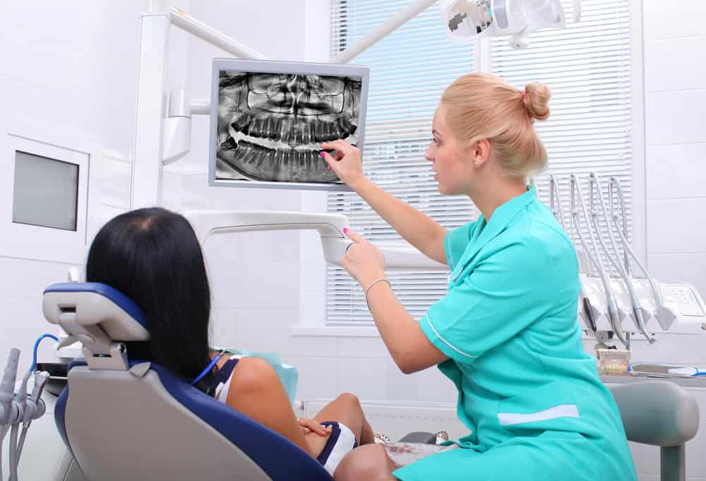 how long does it take to remove 4 wisdom teeth